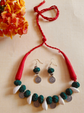 Green cotton balls necklace with cowri
